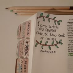 an open bible with the words i am with you always given to the end of the page