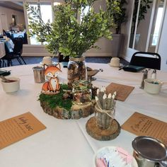 a table topped with lots of different types of decorations