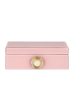 a pink box with a gold handle on it