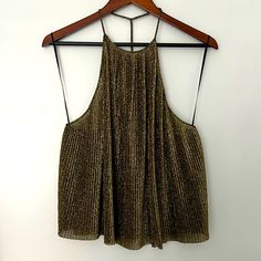 New Never Worn Crimped Gold Black Halter Top Shimmer Lurex Tops For Party, Glitter Tops For Night Out In Spring, Spring Glitter Tops For Night Out, Glitter Tops For Spring Night Out, Chic Shimmer Tops For Night Out, Chic Shiny Tops For Party Season, Summer Evening Sparkling Tops, Chic Sparkling Tops For Night Out, Chic Sparkling Tops For Party Season