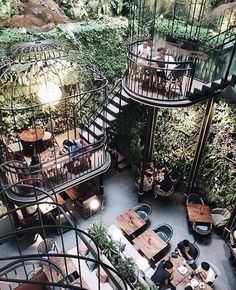 an overhead view of a restaurant with spiral staircases