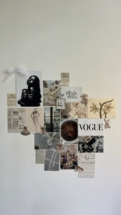 a white wall with many pictures and words attached to the wall, including darth vader's helmet