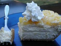 a piece of cake on a blue plate with a fork