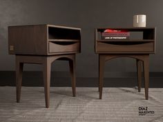 two small wooden tables with books on them