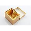 an open square box with gold foil inside