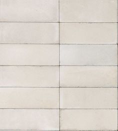 a white brick wall with several lines on it