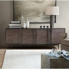 a living room scene with focus on the sideboard