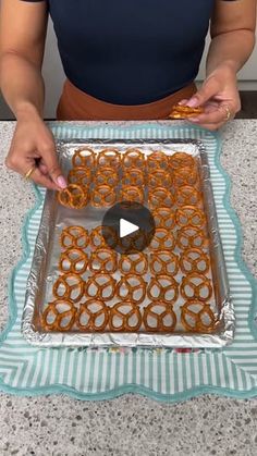 293K views · 3.4K reactions | Grandma's Pretzel Bark | Grandma showed me how to make pretzel bark 💝 | By The Shaba Kitchen | Let's start by adding some
salted pretzels onto our baking sheet. Next I'm going to take
some milk chocolate bars and just place that right on top of
the pretzels. And right next to that one we're going to add
some white chocolate and then one dark chocolate bar. And
then we're going to repeat the same thing. Just alternating a
little bit. And one more. We want this to be low and we're
going to cook these for about 10 to 15 minutes. Look at that.
Just perfect. Alright now I'm going to take a wooden pick
here and we're just going to drag it along our chocolate.
Look at how pretty this is looking. And I'm just going to
start with some beautiful colorful MandM's. Then