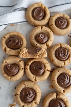 peanut butter cookies with chocolate frosting on a plate