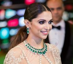 This Green American Diamond Jewelry with a Deepika Padukone-inspired touch, is a stunning Emerald Diamond Necklace, adorned with American Diamonds and Green CZ stones, that exude timeless charm. Embrace the allure of classic Indian designs and make a captivating statement on any occasion. *𝐏𝐑𝐎𝐃𝐔𝐂𝐓 𝐃𝐄𝐓𝐀𝐈𝐋* * Material: Brass * Plating: White Rhodium Plated * Stone: AAA Quality CZ Diamond & Emerald. *𝐃𝐈𝐌𝐄𝐍𝐒𝐈𝐎𝐍𝐒* *Necklace* * Weight:  62 gm Each * Length: 8 Inches * Width: 1.7 Oscar Jewelry, Emerald Diamond Necklace, Hollywood Jewelry, Bollywood Glamour, Emerald Green Necklace, American Diamond Jewellery, Diamond Jewelry Set, American Diamond Necklaces, Silver Necklace Set