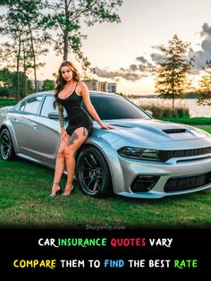 a woman posing next to a silver car in the grass with her leg on the hood