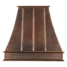 an old style copper range hood on a white background