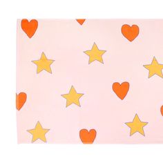 an orange and yellow heart and star pattern on a pink background with white stars in the shape of hearts