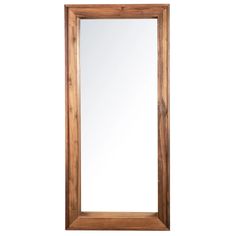 a large wooden mirror on a white wall