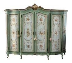 an ornately painted armoire with three doors