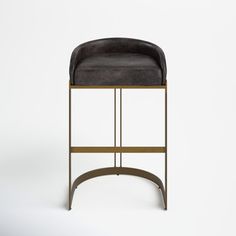 a black and gold chair on a white background with the seat upholstered in leather