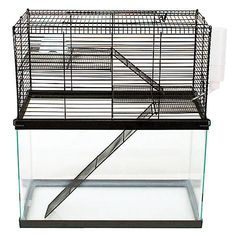 a small cage with a large metal object in it's front end and bottom section