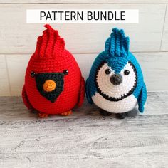 two crocheted stuffed animals sitting next to each other