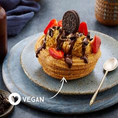 an oreo cookie dessert with strawberries and chocolate on top