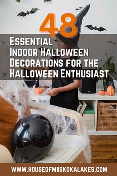 a kid in a room decorated for halloween with text overlay that reads 48 essential indoor halloween decorations for the halloween enthusiast