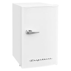 a white refrigerator freezer sitting on top of a white floor next to a wall