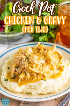 chicken and gravy on top of mashed potatoes