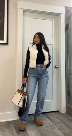 Wide leg jeans, black turtle neck lomg sleeve, sherpa puffer vest, coach color block tote bag #outfitideas #casualstyle #fallfashion #petitestyle Jean Casual Outfit Winter, Comfy Winter Outfits Jeans, Baddie Jeans Outfit Winter, All Black Outfit Ideas Casual, Jeans Outfit Winter Black Women, Cute Turtle Neck Outfits Winter, House Lounge Outfits, Cute Black Vest Outfits, Cute Cause Outfits