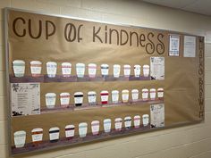 a bulletin board with cups of coffee on it in a school cafeteria or dorm room