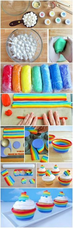 rainbow cupcakes with icing and sprinkles are displayed on a table