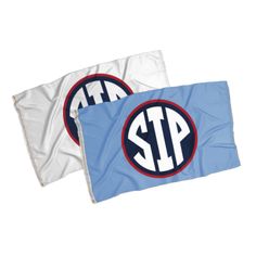 two blue and white towels with the letters at & t on them, one has an oval