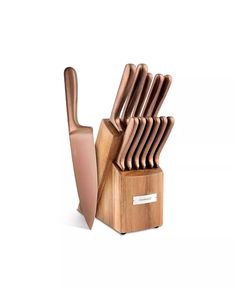 a set of knives in a wooden block