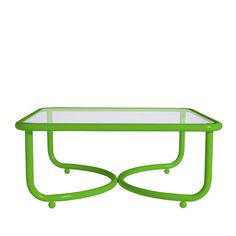 a green coffee table with glass top