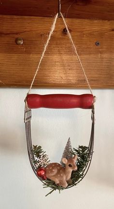 a deer ornament hanging from a wall