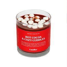 hot cocoa and cozy cuddles in a canister on a white background with the lid open