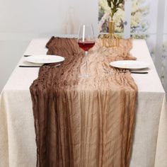 Made of high quality polyester fiber material, the gradient color table runner is comfortable and soft to the touch, and can be used as a decorative table runner for many occasions. Latitude Run® | Latitude Run® Boho Cheesecloth Table Runner Polyester in Brown | 35" D X 120" L | Wayfair Cheesecloth Table Runner, Gradient Colour, Boho Table Runner, Color Table, Decorative Table, Colorful Table, Cheese Cloth, Outdoor Cooking, Gradient Color