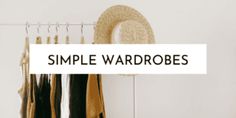 a simple wardrobe with clothes hanging on the rack and a straw hat above it that says, simple wardrobes