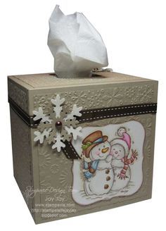 a tissue box with a snowman on it