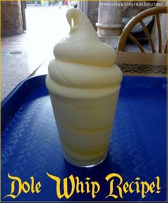 an ice cream sundae sitting on top of a blue tray with the words dole whip recipe