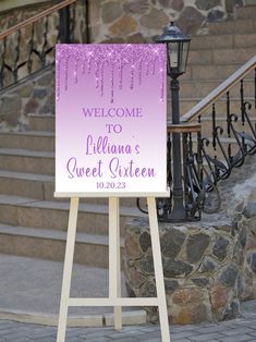 a welcome sign is displayed in front of some steps and railings, with the words welcome to juliana's sweet sixteen written on it