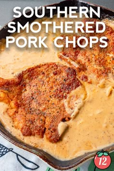 southern smothered pork chops with gravy in a cast iron skillet