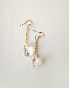 Crystal Chip Earrings, Raw Crystal Earrings, Clear Drop Earrings Springtime in the Desert Collection - Spring 2019 A large chip of crystal quartz has been tumbled and smoothed to form a great go to dangle earring. All earrings are one of a kind, as each stone is unique. Thanks for looking ♥ Looking for something different, check out our other earrings. http://www.etsy.com/shop/laurastark?section_id=7493297 Back to the Main Shop: http://www.laurastark.etsy.com Faceted Clear Crystal Earrings Gift, Clear Dangle Crystal Earrings As A Gift, Clear Long Drop Earrings For Gift, Faceted Clear Drop Earrings, Clear Faceted Drop Earrings, Raw Crystal Earrings, Chip Earrings, Crystal Stone Jewelry, Diamond Shape Earrings