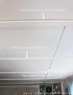 the underside of a ceiling that has been painted white and is labeled with arrows pointing to different areas