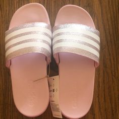 New With Tags. -Pink With Silver And White Stripes. The Silver Stripes Are Sparkling. - Size 2 Trendy Pink Slippers With Cushioned Footbed, Pink Open Toe Slippers For Spring, Pink Slide Sandals For Summer, Pink Cushioned Slippers For Spring, Pink Slide Sandals With Cushioned Footbed, Cute Slip-on Slides For Spring, Trendy Pink Round Toe Slides, Cute Spring Slip-on Slides, Pink Cushioned Flip Flops For Spring