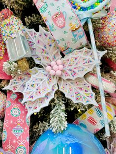 an assortment of christmas decorations on display for sale