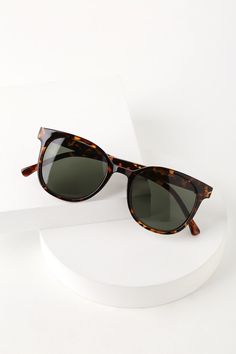 Make some boss babe moves in the Lulus CFO Tortoise Sunglasses! Shiny tortoise frames in a slightly oversized design hold black tinted lenses. UV 400. Frames measure 5. 75" wide. Arms measure 5. 75" long. Nickel, brass and plastic. Imported. Lulus | CFO Tortoise Sunglasses. Vegan Purses, Cute Sunglasses, Tortoise Sunglasses, Small Faces, Cool Sunglasses, Oversized Sunglasses, Cute Purses, Trendy Jewelry, Boss Babe