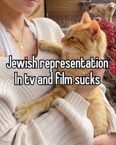 a woman holding a cat with the caption jewish representation in tv and film sucks