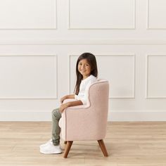 Transform your playroom or bedroom with ECR4Kids Bouclé Mila Arm Chair, creating a cozy haven for your little ones to immerse themselves in their favorite book during story time. The children's chair is as soft as a cloud, thanks to the plush sherpa material. The club chair design features a sleek silhouette, complete with a gently curved back and comforting armrests. The modern furniture is crafted for comfort with a removable cushion for ease of cleaning; the chair's details are designed for … Pink Sherpa Accent Chair, Kids Chairs, Club Chairs, Kids Furniture, Chair Design, Modern Furniture, Cushions, Flooring, Furniture