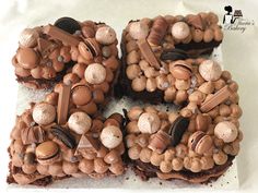 there is a cake made to look like the letter e with chocolate and nuts on it