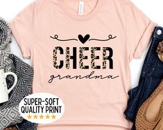 This cheer grandma shirt with leopard print is the perfect tee for any cheerleading team grandmother! Our Unisex T-shirts are High Quality, SUPER soft and SUPER comfy. They are made of 100% Cotton. Heather tees are a soft cotton-poly blend. Tees are Bella+Canvas 3001 Unisex HOW TO ORDER * Please check all photos from the listing. * Please check all size chart measurements ( width and length) before size decision. * Please choose your shirt size (pay attention to style listed with each size). * C Cheer Parent Shirts, Cheer Grandma, Cheer Crafts, Aunt Tshirt, Sister T Shirt, Cheer Mom Shirt, Cheerleading Mom, Cheerleading Team, Cheer Shirt