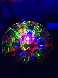 a colorful light up object sitting on top of a table